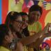 ThesuperstarsmingledwiththeF2employeesall-throughouttheevent;takingpicturesandplayinggameswiththem.